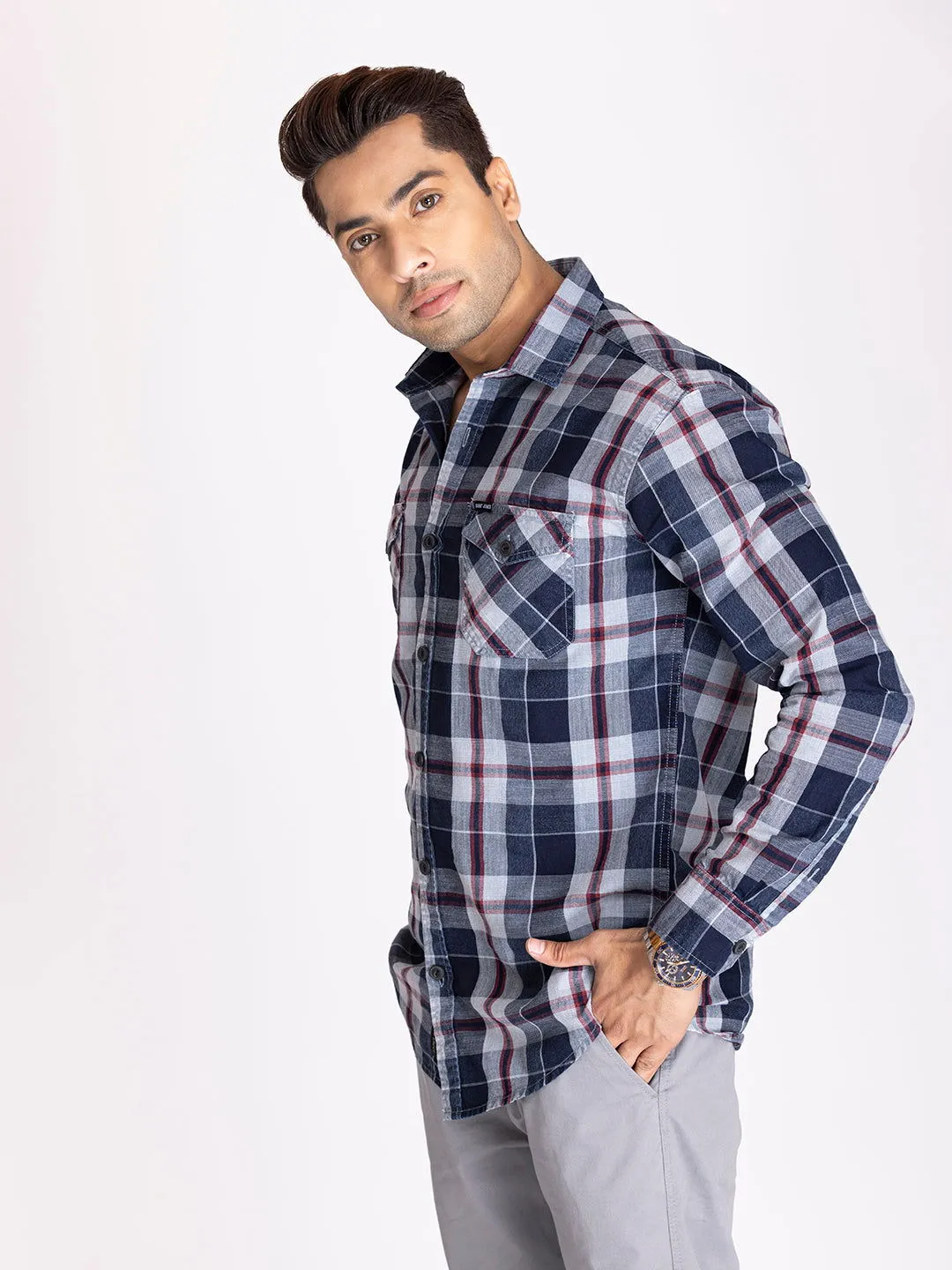 Indigo blue check shirt.